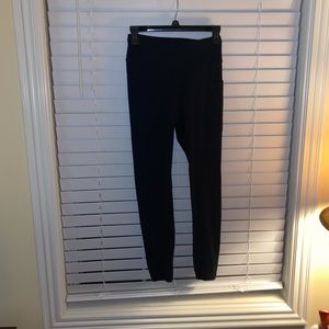 Black workout leggings with pockets. Size M. Worn once Soft and stretchy.